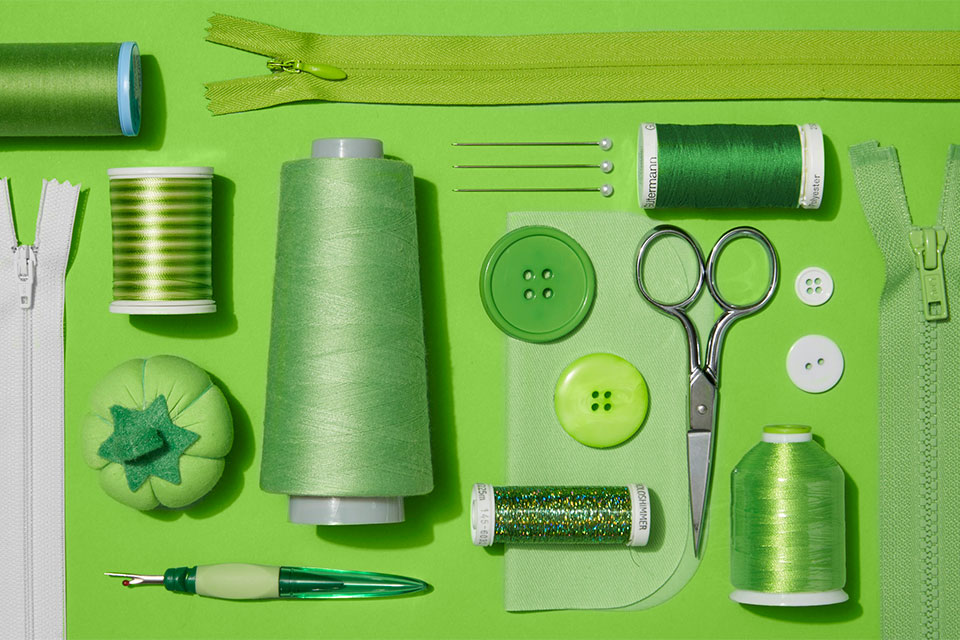 Green thread and sewing tools