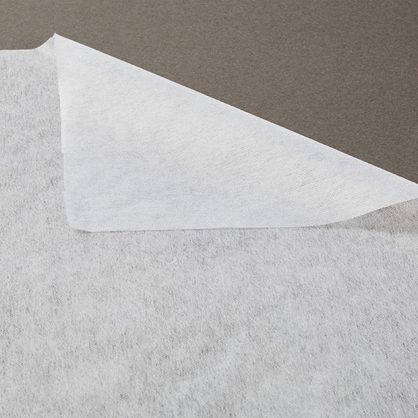 folder over corner of white sewn-in interfacing