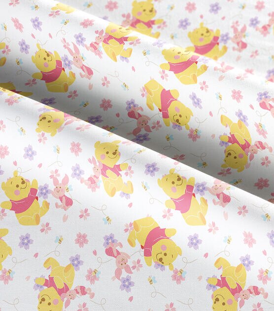 353 COTTON fabric white background with tossed Winnie the Pooh Piglet and  stars sold by the yard.