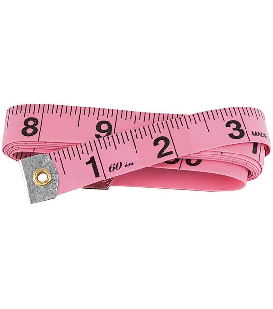 Tape Measure for Sewing. Measuring Tape for Body in a Soft Pink