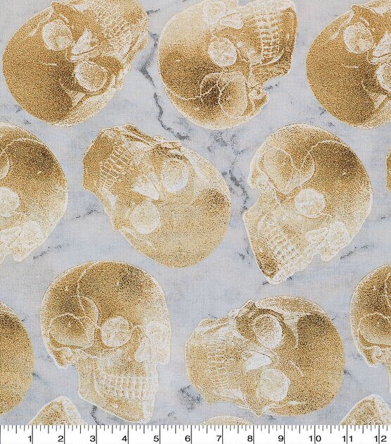 Tossed Gold Skulls Halloween Metallic Cotton Fabric