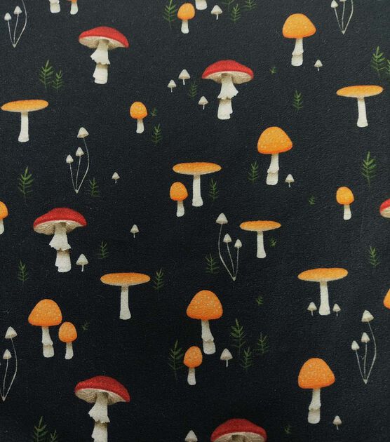 Mushrooms on Black Double Brush Jersey Knit Fabric | JOANN