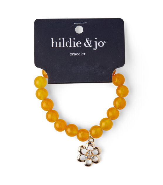 Yellow Beaded Stretch Bracelet With Gold Flower Charm by hildie & jo