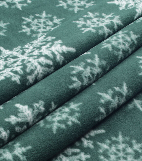 White Snowflakes on Green Anti Pill Fleece Fabric, , hi-res, image 2