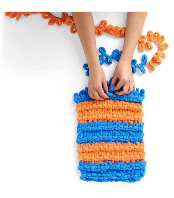 How to Make a Loop Yarn Blanket - Cutesy Crafts