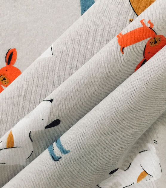 Winter Grey Tossed Dogs Jersey Knit Fabric by POP! | JOANN