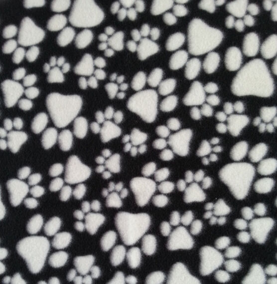 Blizzard Fleece Fabric  Paw Prints on Black