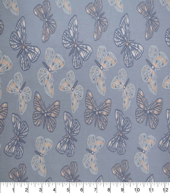 Butterflies on Blue Quilt Cotton Fabric by Quilter's Showcase