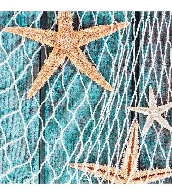 Old fish nets give a nice background to hang fish, starfish