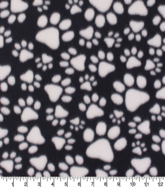 Blizzard Fleece Fabric Paw Prints on Black, , hi-res, image 1