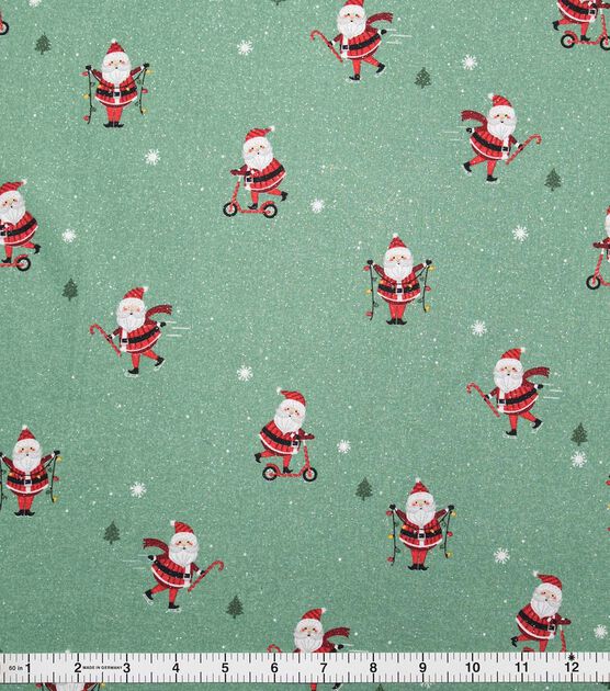 Scootering Santa's on Green Christmas Glitter Cotton Fabric