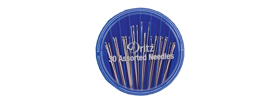 hand sewing needles in round blue container