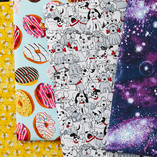 Shop Novelty Cotton fabrics at JOANN stores with themes like bees, donuts, dogs and galaxy