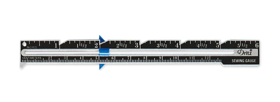 black and silver seam gauge