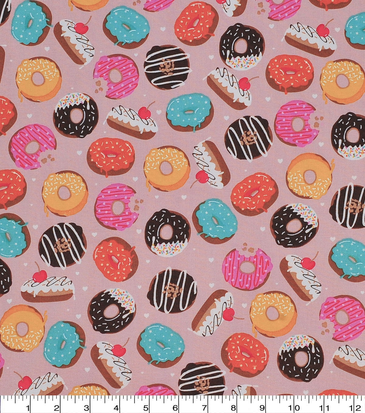 Novelty Cotton Fabric Tossed Donuts on Pink | JOANN